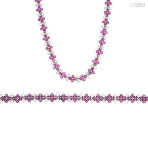 A ruby and diamond necklace and bracelet. Each designed