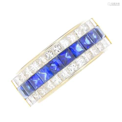 An 18ct gold sapphire and diamond half eternity ring.