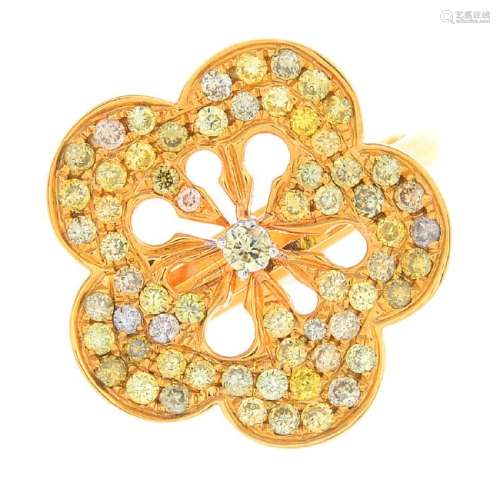 An 18ct gold coloured diamond floral dress ring. The