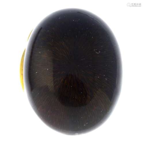 An enamel pill box. Of oval outline, the brown