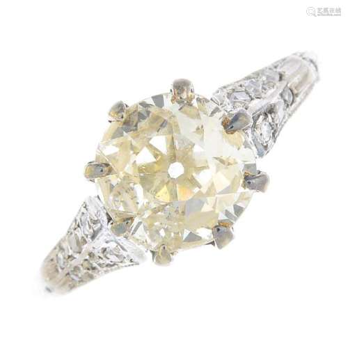 A diamond single-stone ring. The old-cut diamond, with