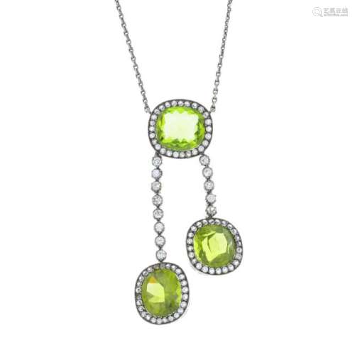 A peridot and paste negligee necklace. Comprising two