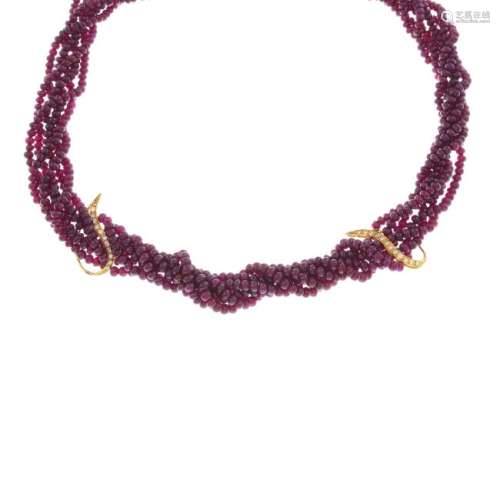 ASPREY & CO. - an 18ct gold diamond and ruby necklace.