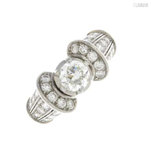A mid 20th century platinum diamond dress ring. The