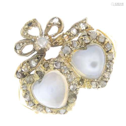 An early 20th century moonstone and diamond ring.