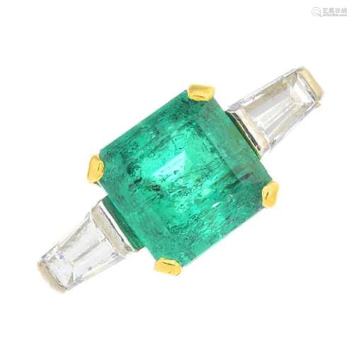 An 18ct gold Colombian emerald and diamond dress ring.