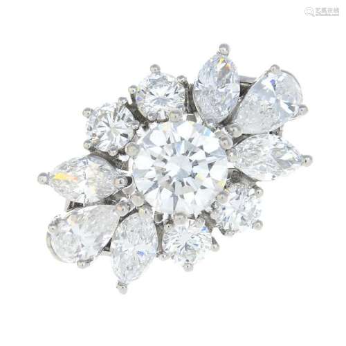 A diamond cluster ring. The brilliant-cut diamond, with