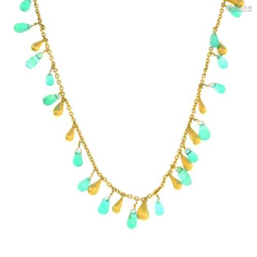 An 18ct gold emerald bead necklace. Designed as a