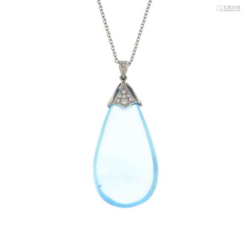 An aquamarine and diamond pendant. Designed as a
