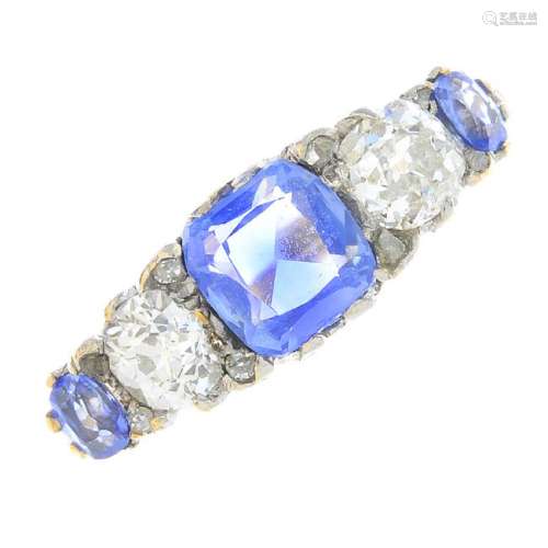 A sapphire and diamond five-stone ring. The graduated