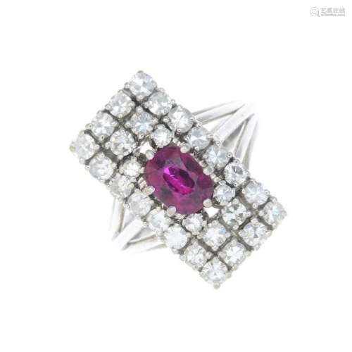 A ruby and diamond cluster ring. Of rectangular