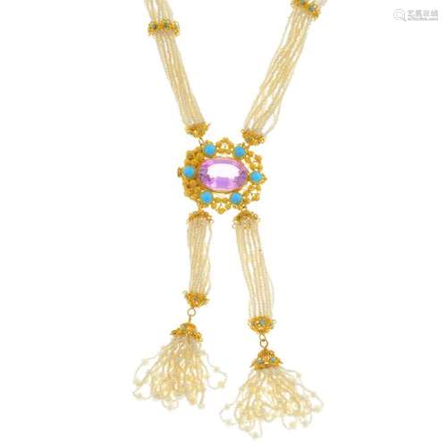 A gem-set necklace. Designed as two seed pearl tassels,