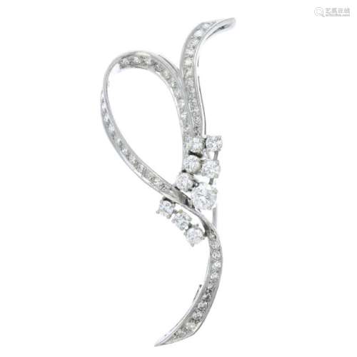 A diamond brooch. Designed as a pave-set diamond