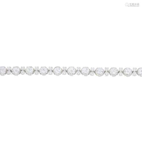 A diamond bracelet. The brilliant-cut diamond line,