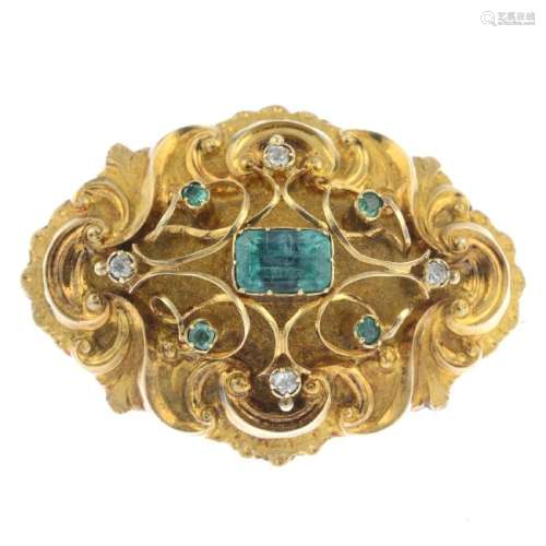 A mid Victorian gold emerald and diamond brooch. Of