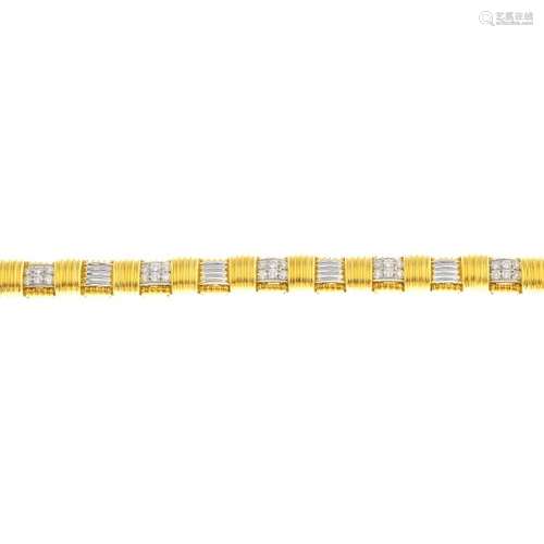 ROBERTO COIN - an 18ct gold diamond bracelet.