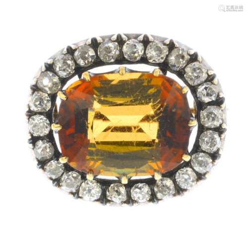 A late 19th century topaz and diamond brooch. The