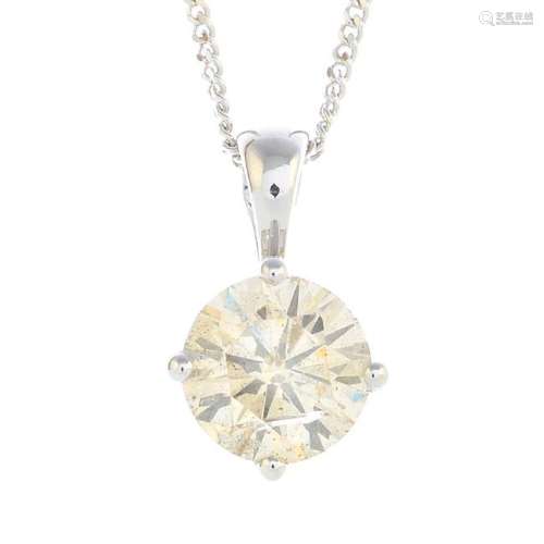 An 18ct gold diamond single-stone pendant. Designed as