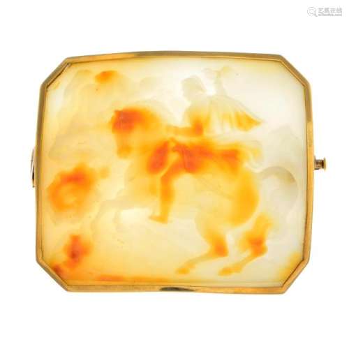 A 19th century gold shell cameo brooch. The rectangular