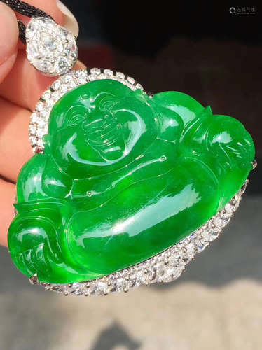 A LAUGHING BUDDHA SHAPED JADEITE PENDANT