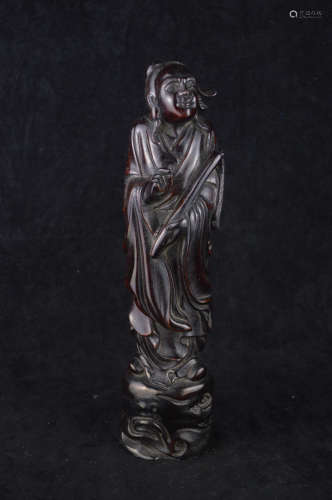 A TAOIST HAN IMMORTAL SHAPED WOOD CARVING