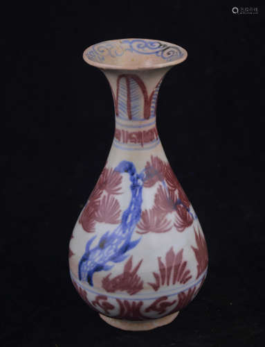 A UNDERGLAZE RED PEAR SHAPED VASE