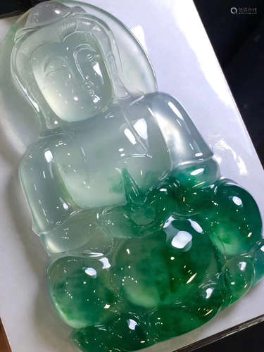 A GUANYIN SHAPED NATURAL JADEITE PENDANT