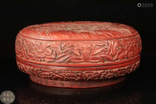 A RED LACQUER CARVED CHARACTER PATTERN BOX
