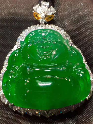 A LAUGHING BUDDHA SHAPED JADEITE PENDANT