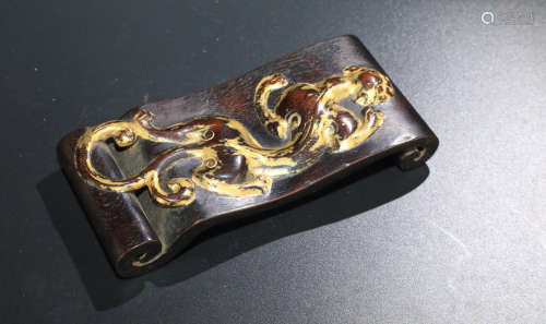 A ZITAN WOOD CARVED BOOK SHAPED INK BED