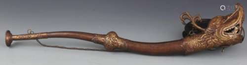 A BRONZE DRAGON SHAPE TIBETAN RELIGIOUS HORN