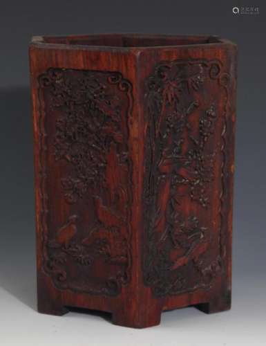 A FINELY CARVED SQUIRE ROSEWOOD BUSH POT