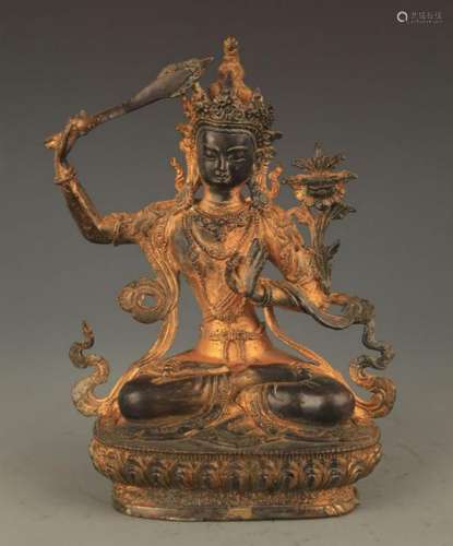 A BRONZE TIBETAN MANJUSRI BUDDHA