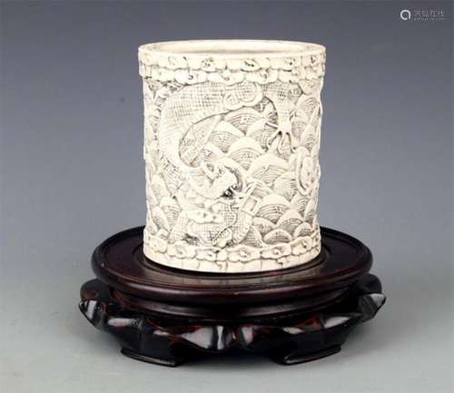 A WHITE COLOR GLAZED PORCELAIN BRUSH HOLDER