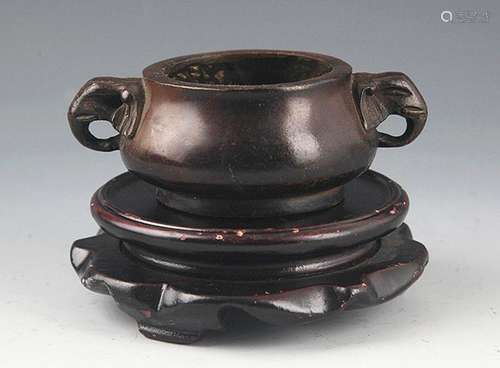 A BLACK COLOR ELEPHANT HANDLE BRONZE CENSER