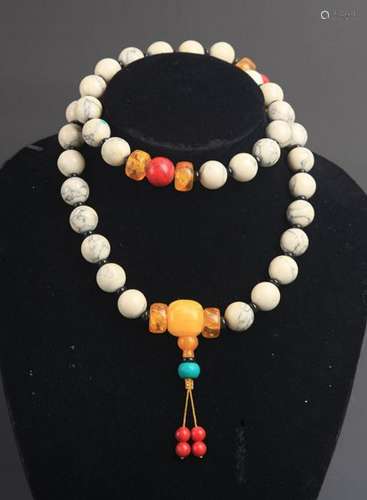 A FINE CORAL AND AMBER NECKLACE