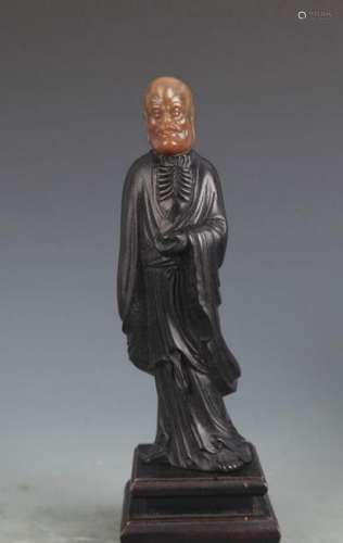 A SANDALWOOD DA MO FIGURE WITH SOAPSTONE