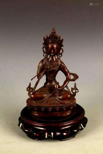 A FINELY CARVED TIBETAN BUDDHA