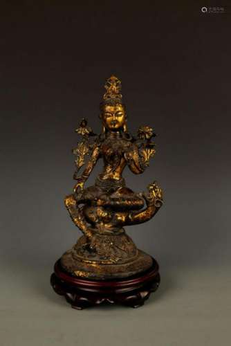 A TALL TIBETAN BRONZE FEMALE BUDDHA FIGURE