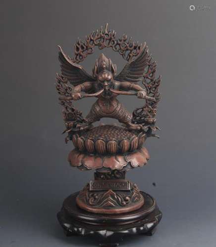 A TALL TIBETAN GARUDA STATUE