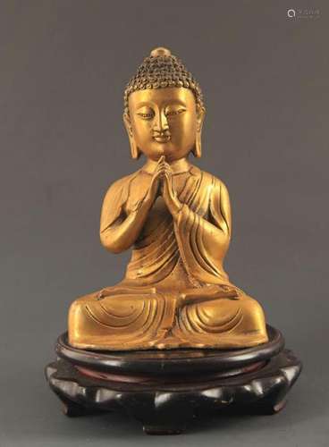 A BRONZE SEATED BUDDHA STATUE