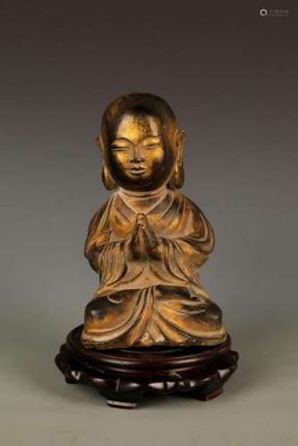 A FINELY CARVED YONG BUDDHA BRONZE FIGURE