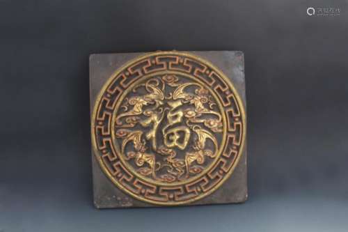 A FINE GILT LACQUERED PLAQUE CARVING WITH 