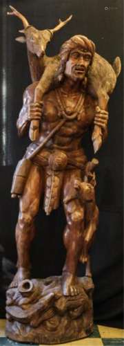 MONUMENTAL WOODEN STATUE OF A MELANESIAN