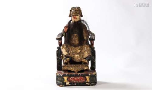 CHINESE CARVED AND LACQURED SEATED FIGURE