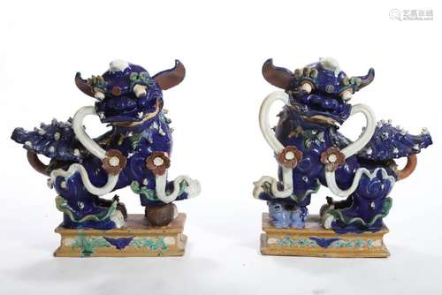 PAIR OF CHINESE GLAZED EARTHENWARE TEMPLE DOGS