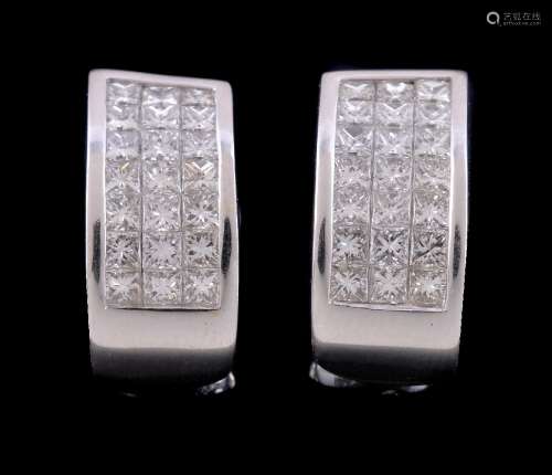 A pair of diamond earrings