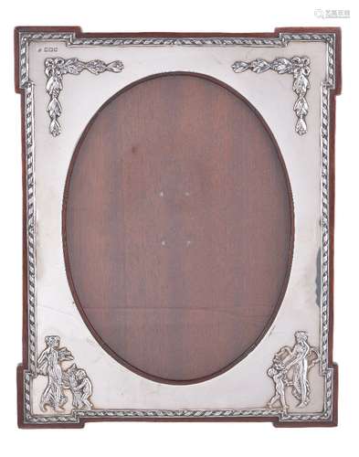 An Edwardian silver photograph frame by William Comyns & Sons