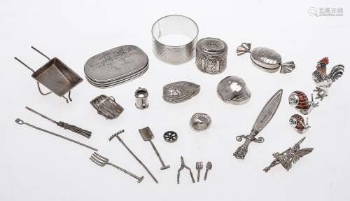 A collection of silver and silver coloured small boxes and ornaments