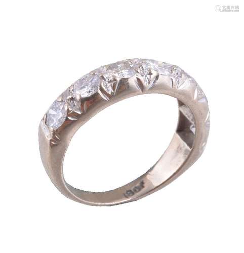 A diamond seven stone ring